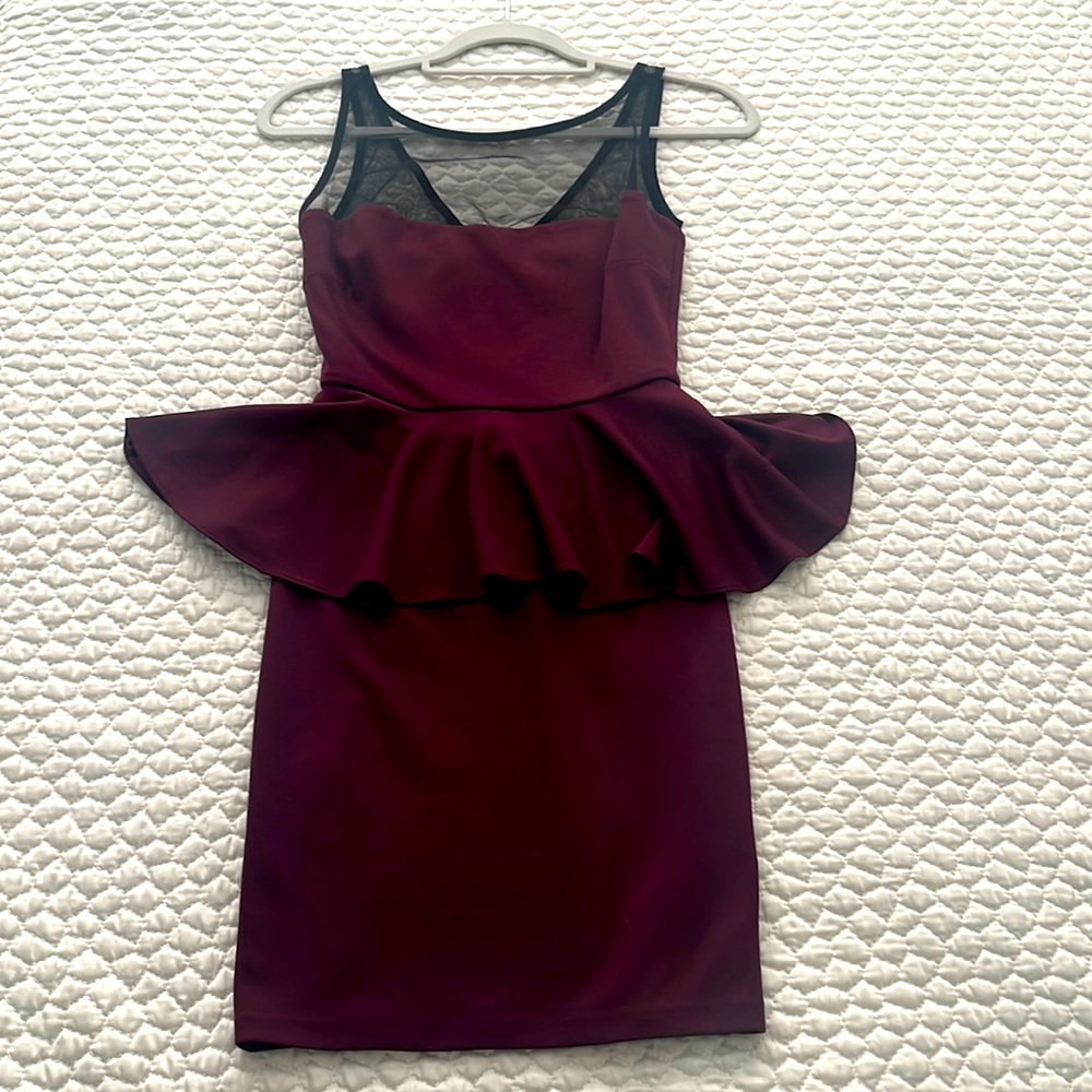 Aqua brand peplum dress with black sheer neck detail
